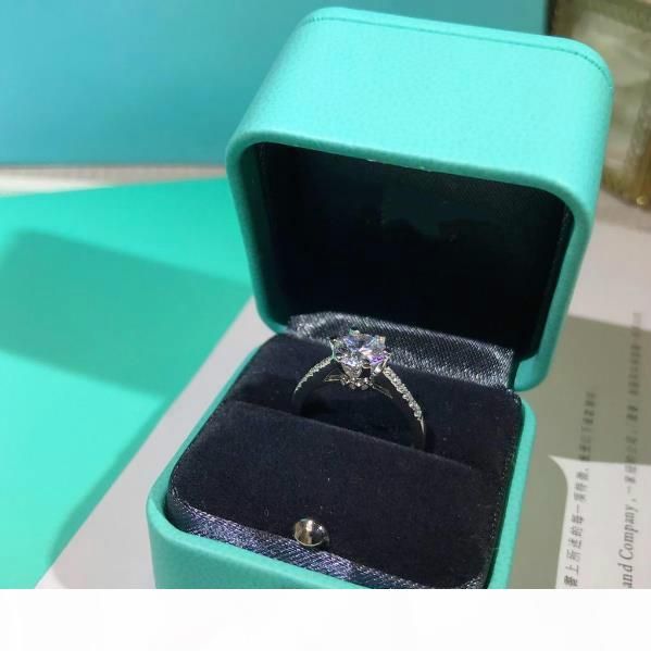 2020 One Cara Round Diamond Ring High Carbon Diamond Main Stone Small Diamond Embracing And Inlaying Six Small Gripper Inner Ring Hollow Art Bod From