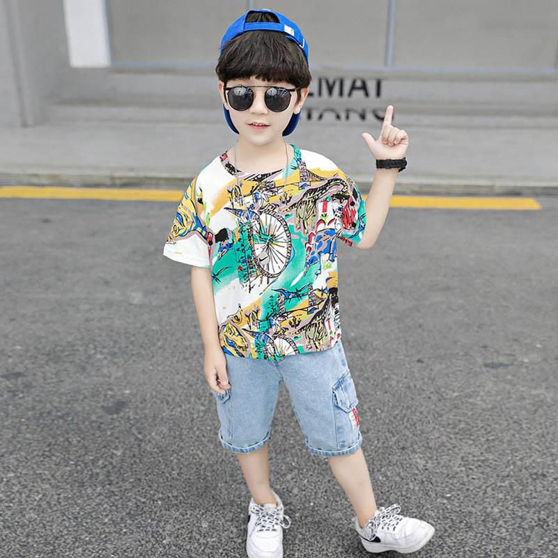 Verano de dibujos animados niños casuales trajes de dinosaurios juegos de los cabritos muchachos que arropan la camiseta + pantalones cortos de mezclilla vaqueros 2pcs / niños conjunto de ropa al por menor Verano de dibujos animados niños casuales trajes de dinosaurios juegos de los cabritos muchachos que arropan la camiseta + pantalones cortos de mezclilla vaqueros 2pcs / niños conjunto de ropa al por menor