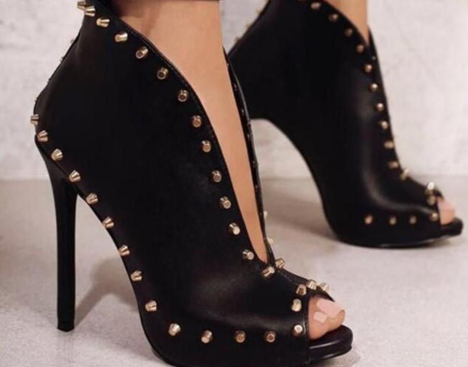 black heeled open toe boots