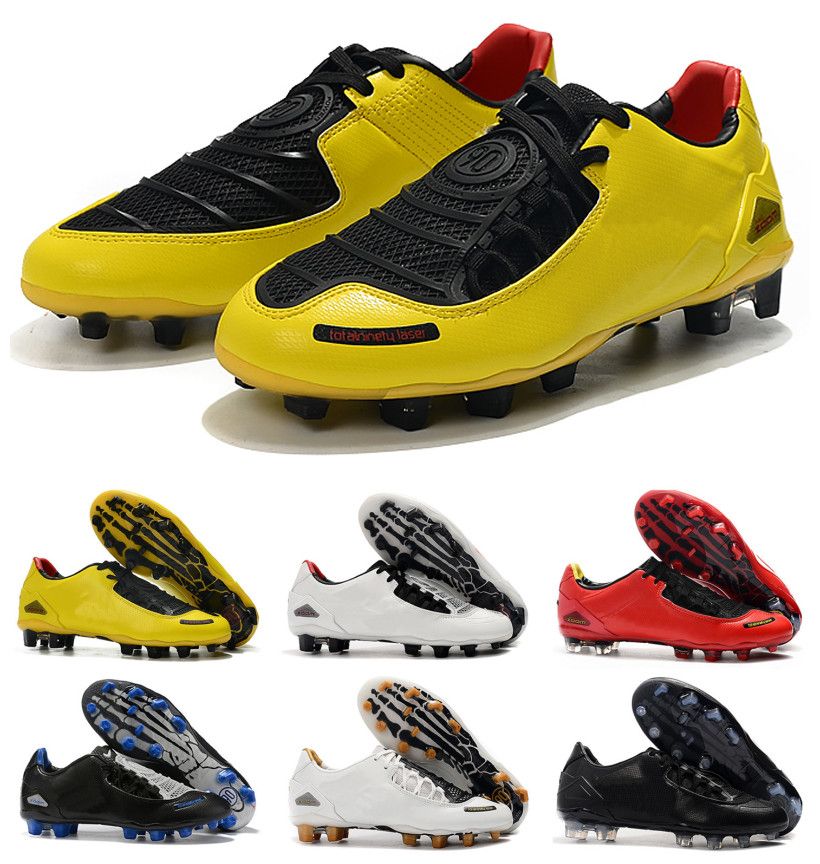 green laceless football boots