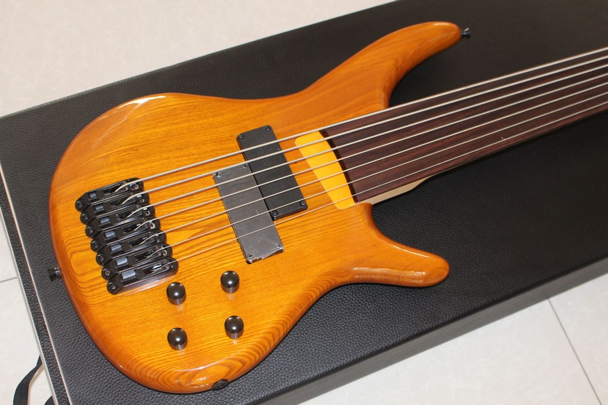 Compre NUEVO 7 STRING BASS NATURAL FRETless Bass Guitar Guitar Guitarra  China A 282,68 € Del Allguitar2017 | Es.Dhgate.Com