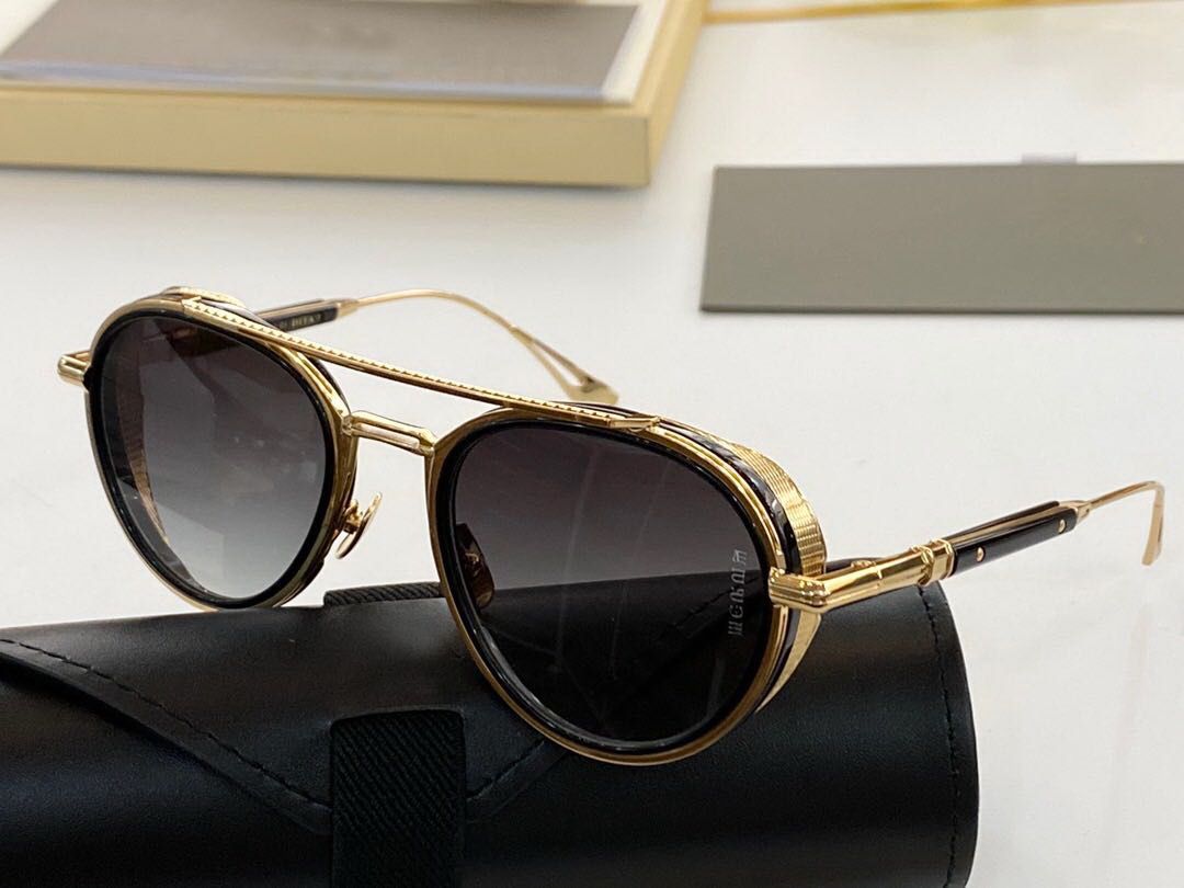 Gold frame black lenses