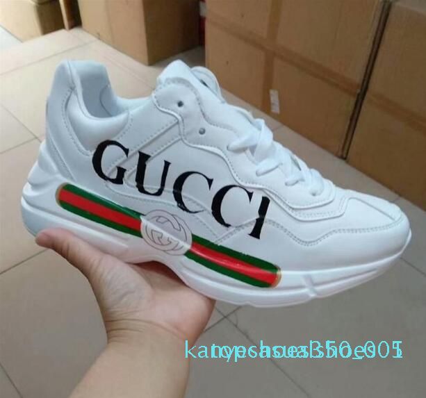 white branded trainers