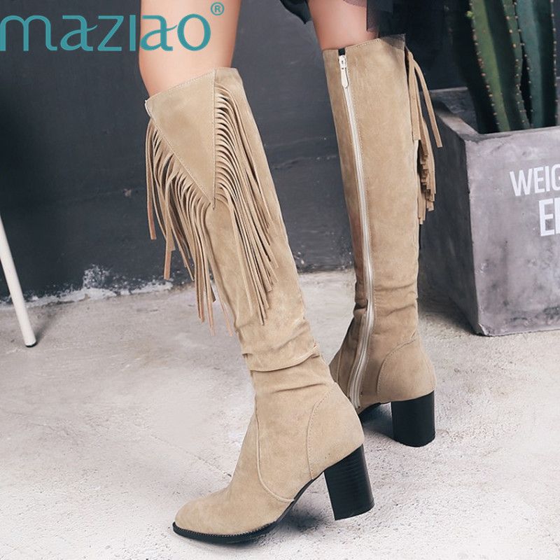 knee high fringe boots