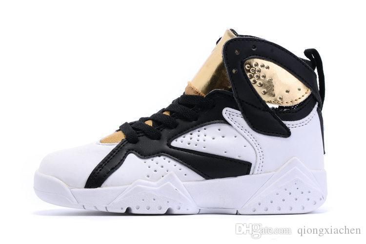 black and gold youth basketball shoes