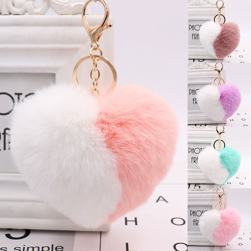 and pompoms heart fluffy shape. Keychain with name