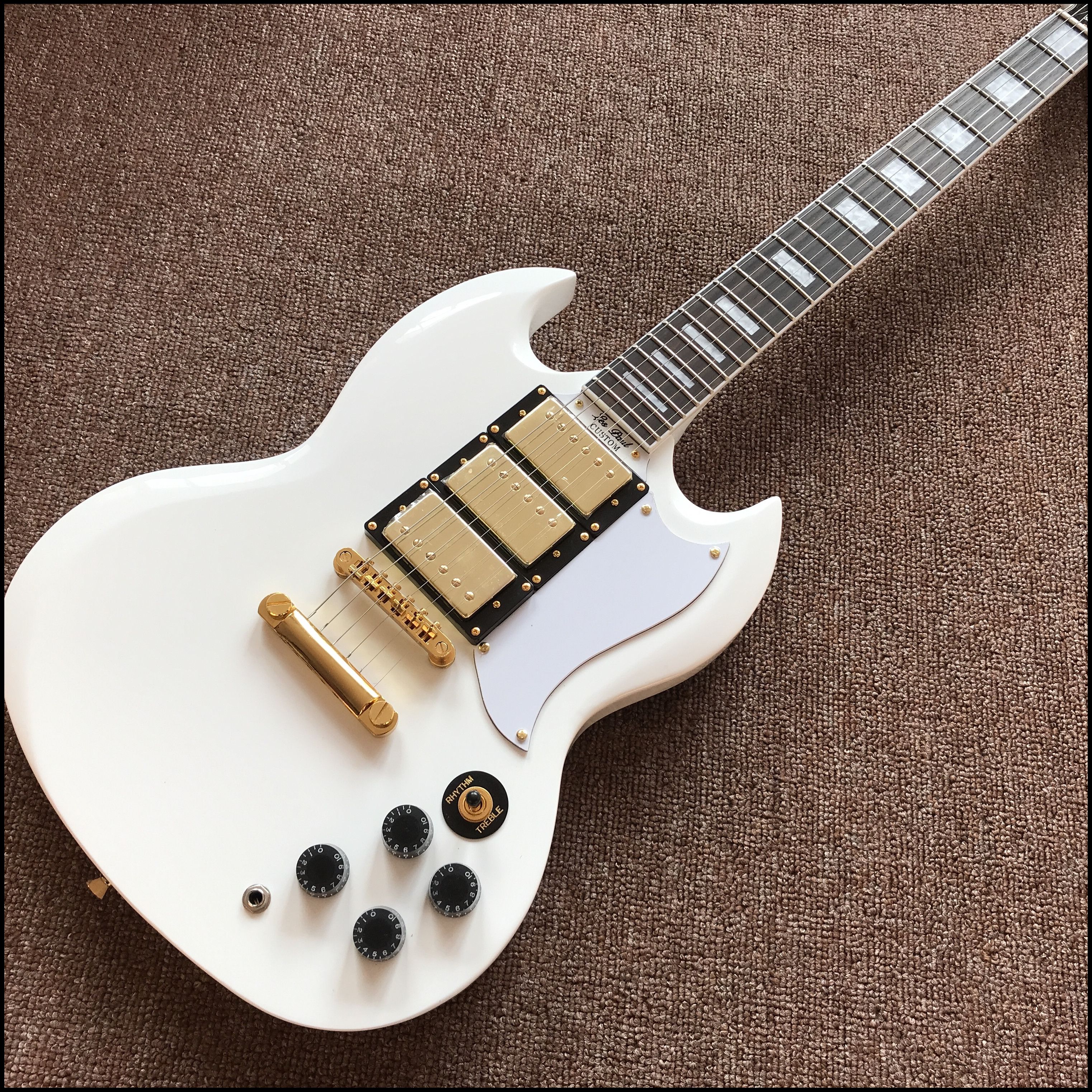 Cream Color Electric Guitar With 3 Pickups And Rose Wood Fingerboard
