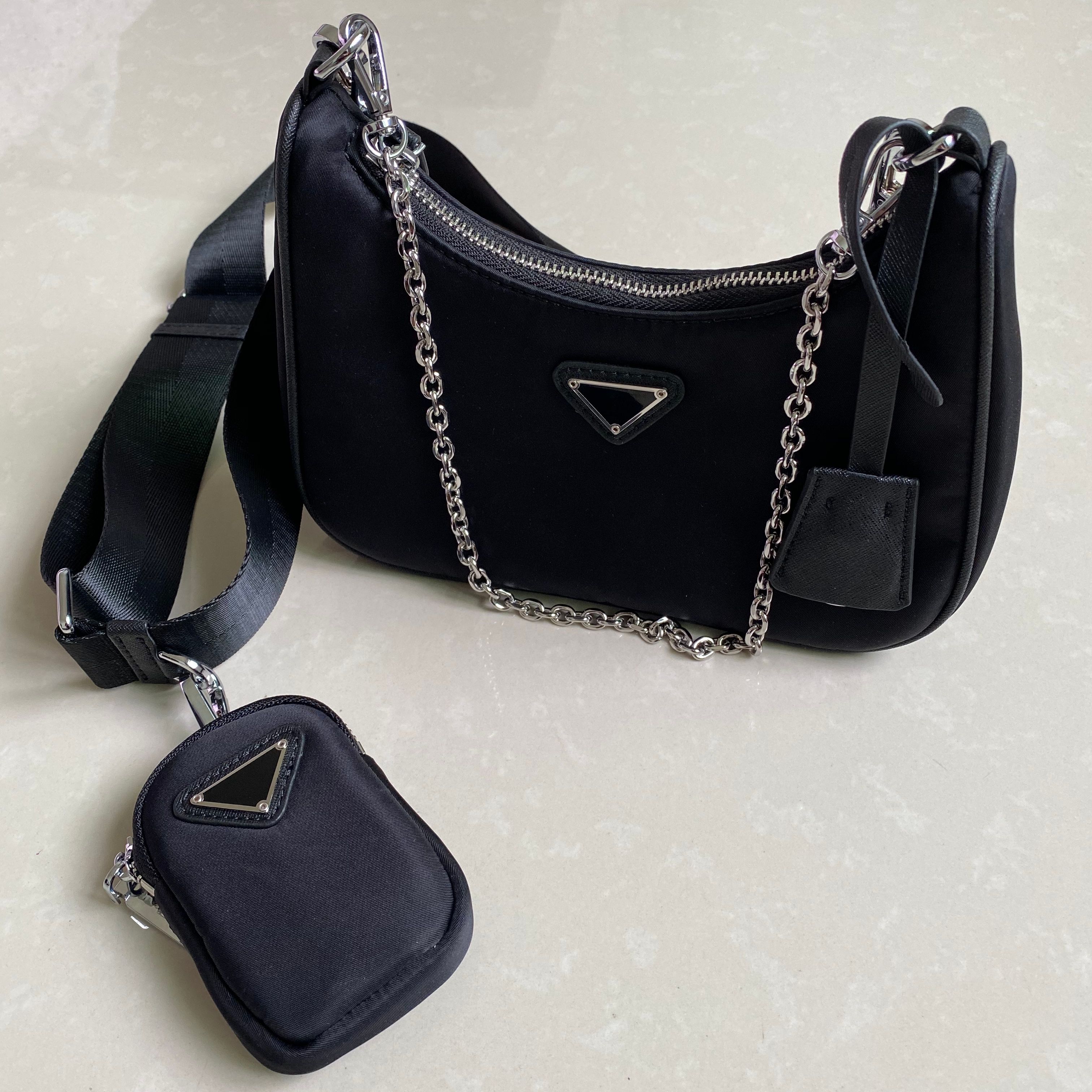 chain embellished leather and recycled nylon shoulder bag