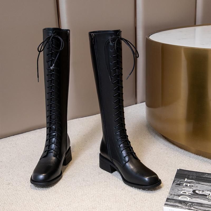 knee length black boots