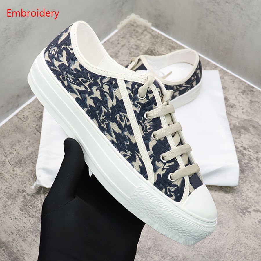 gold designer trainers