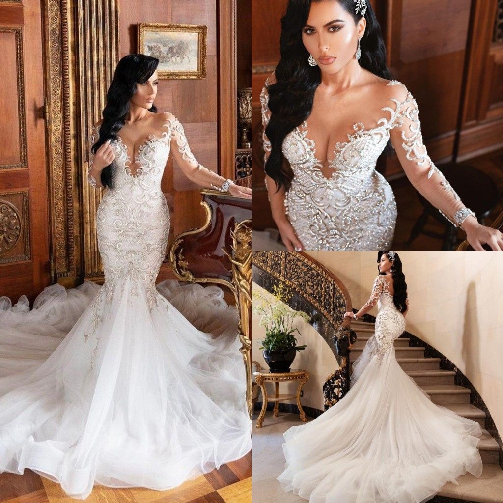 2021 Luxury Crystals Mermaid Wedding Dresses Illusion Long Sleeves Lace