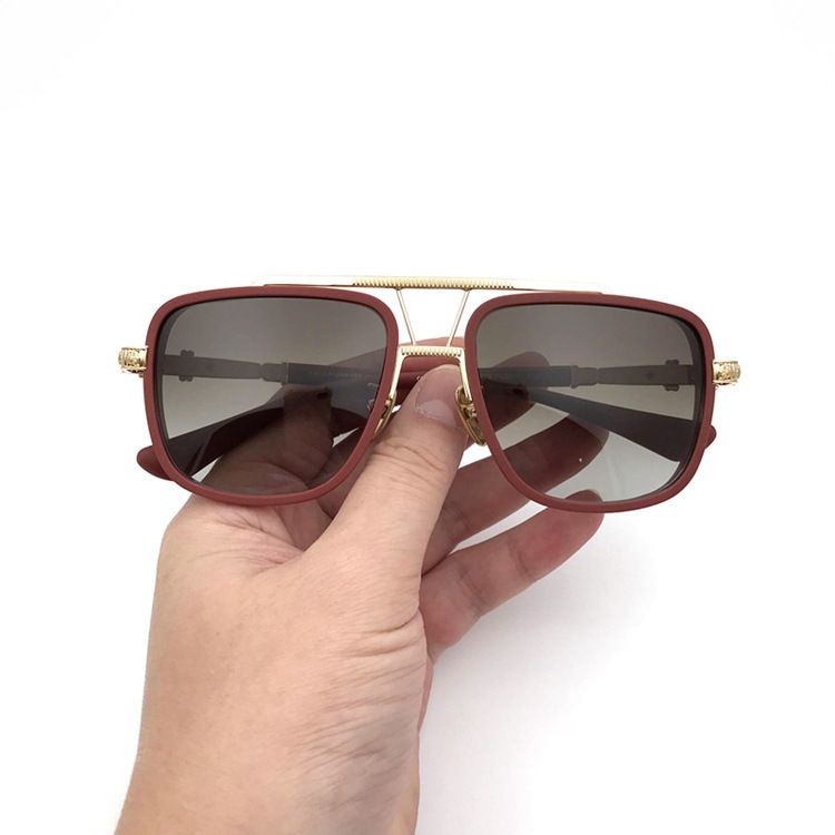 Red frame brown lenses