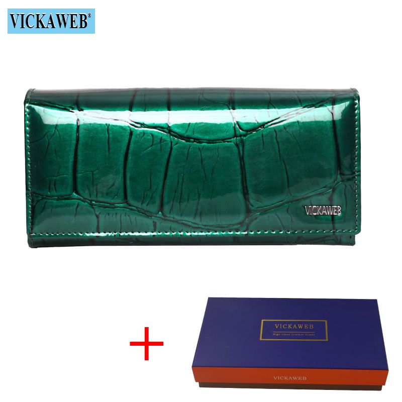Grön plånbok och låda