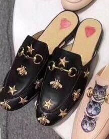 black leather with bee stars