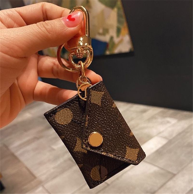 Handmade Leather Designer Keychain Purse For Men And Women Luxury Car  Keyring With Buckle, Fashionable Bags Pendant By Classic Brand From Tomsid,  $17.59