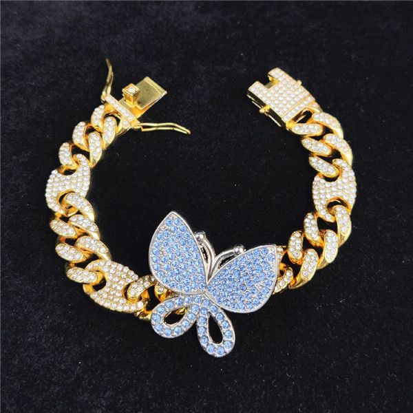 gold with blue butterfly