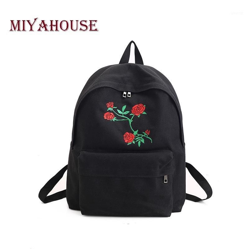 black backpack with roses