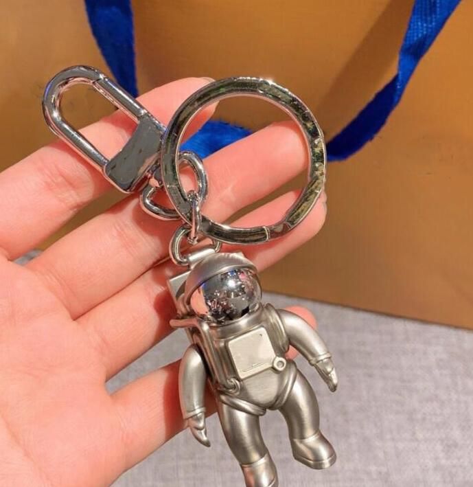 Silver Metal 3D Astronaut Space Robot Astronaut Keychain Fashionable Car  Accessory For Advertising And Waist Wear From Accessoriesstore976, $23.63