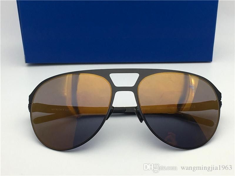 black frame gold lens