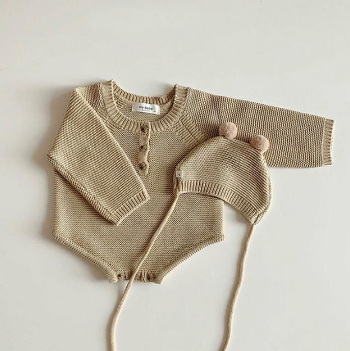 # 1 Baby stickad romper