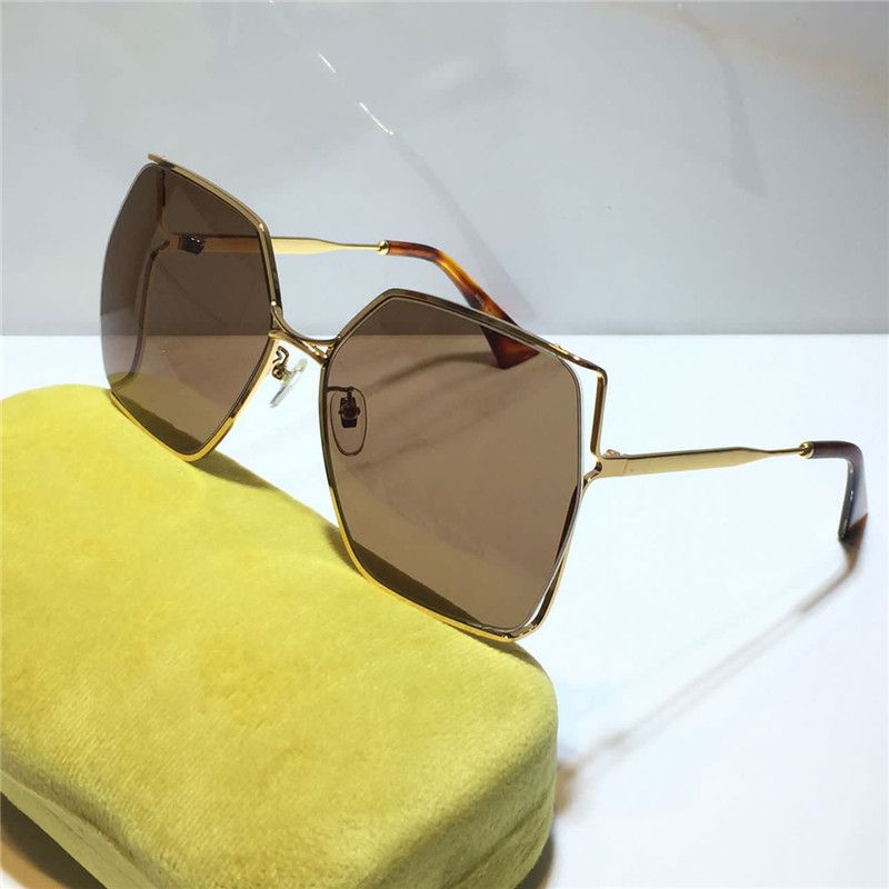 gold frame dark brown lens