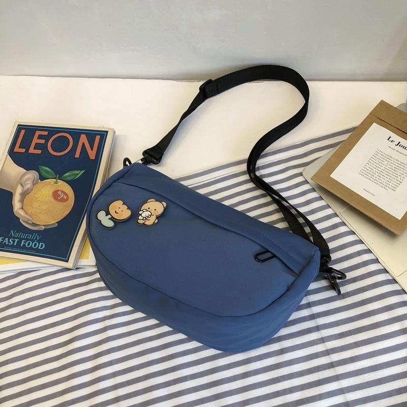 small cloth shoulder bolsa