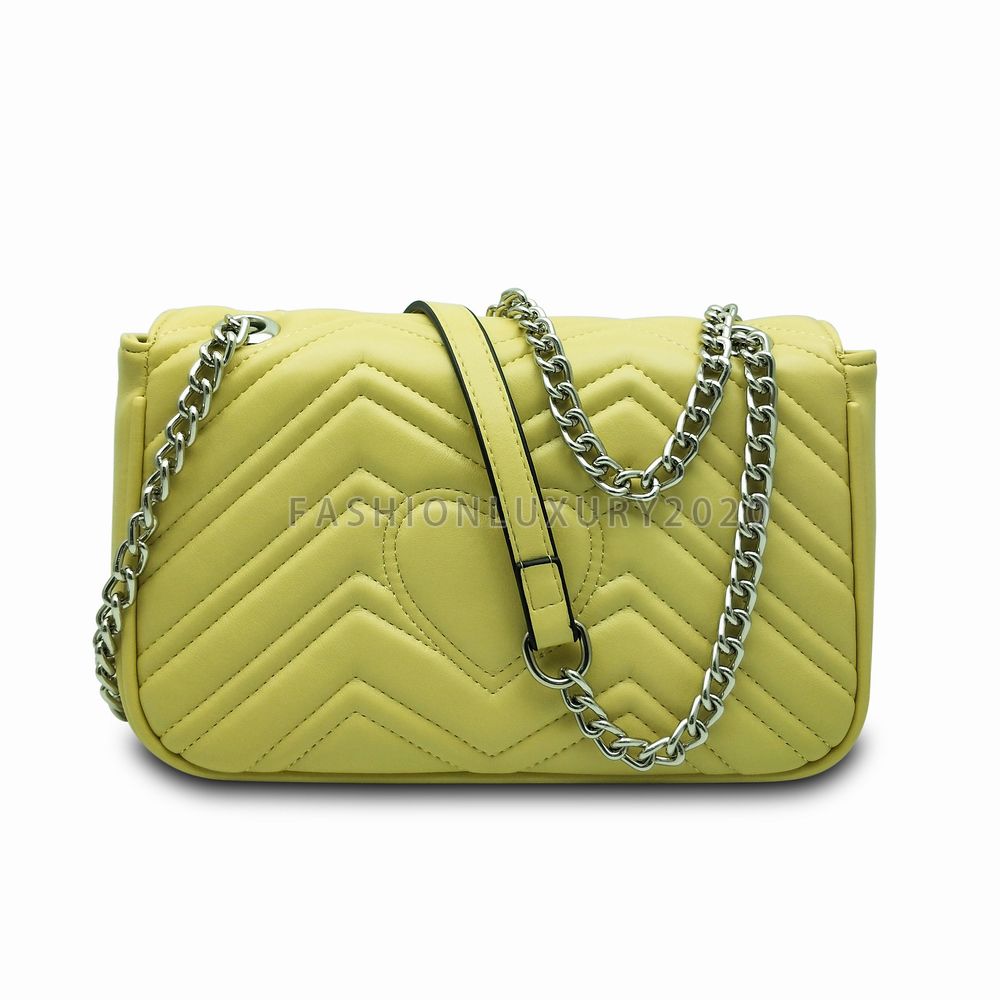 Yellow bag with silver chain