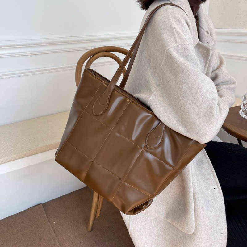 designer saddle handbolsas