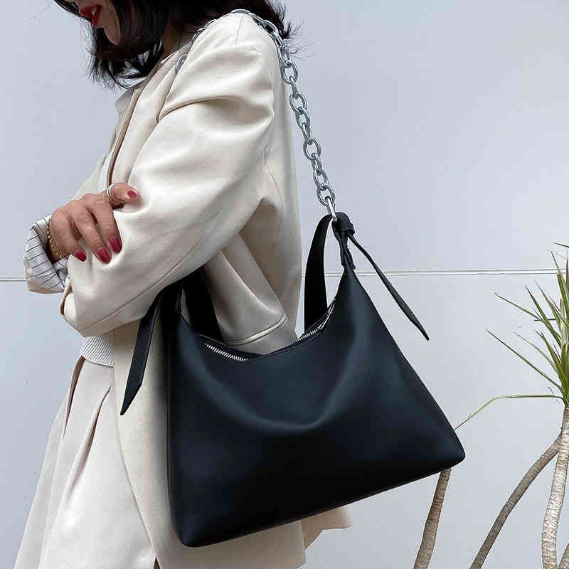 Bolso de hombro Sixtysevene en color negro con flecos transformable a mano  · Sixtyseven · El Corte Inglés