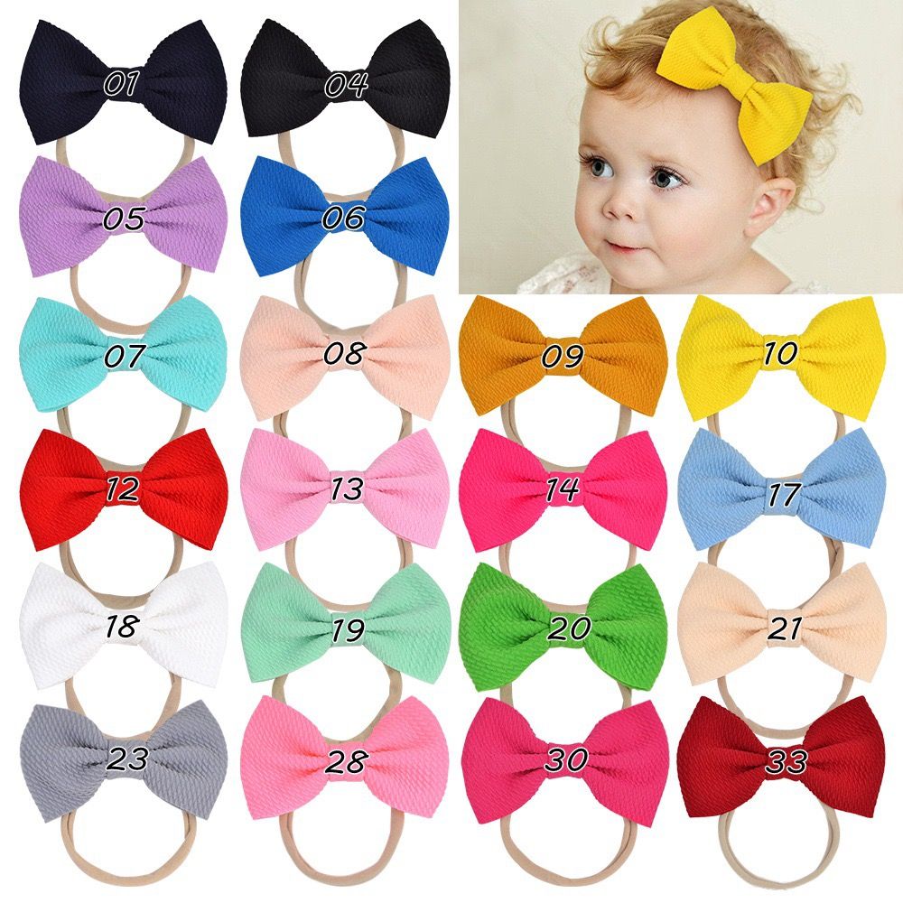 Bebé Niñas Bowknot Nylon Diadema Recién nacido Elástico Color Color Headwear Bebé Niñas Bowknot Nylon Diadema Recién nacido Elástico Color Color Headwear