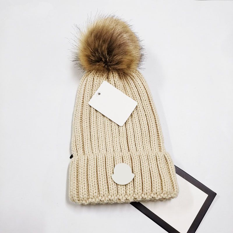 Boys designer bobble hat hot sale