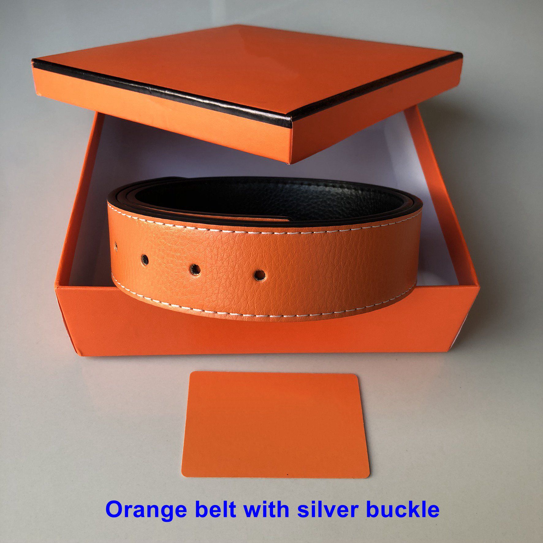 Ceinture orange avec boucle en argent