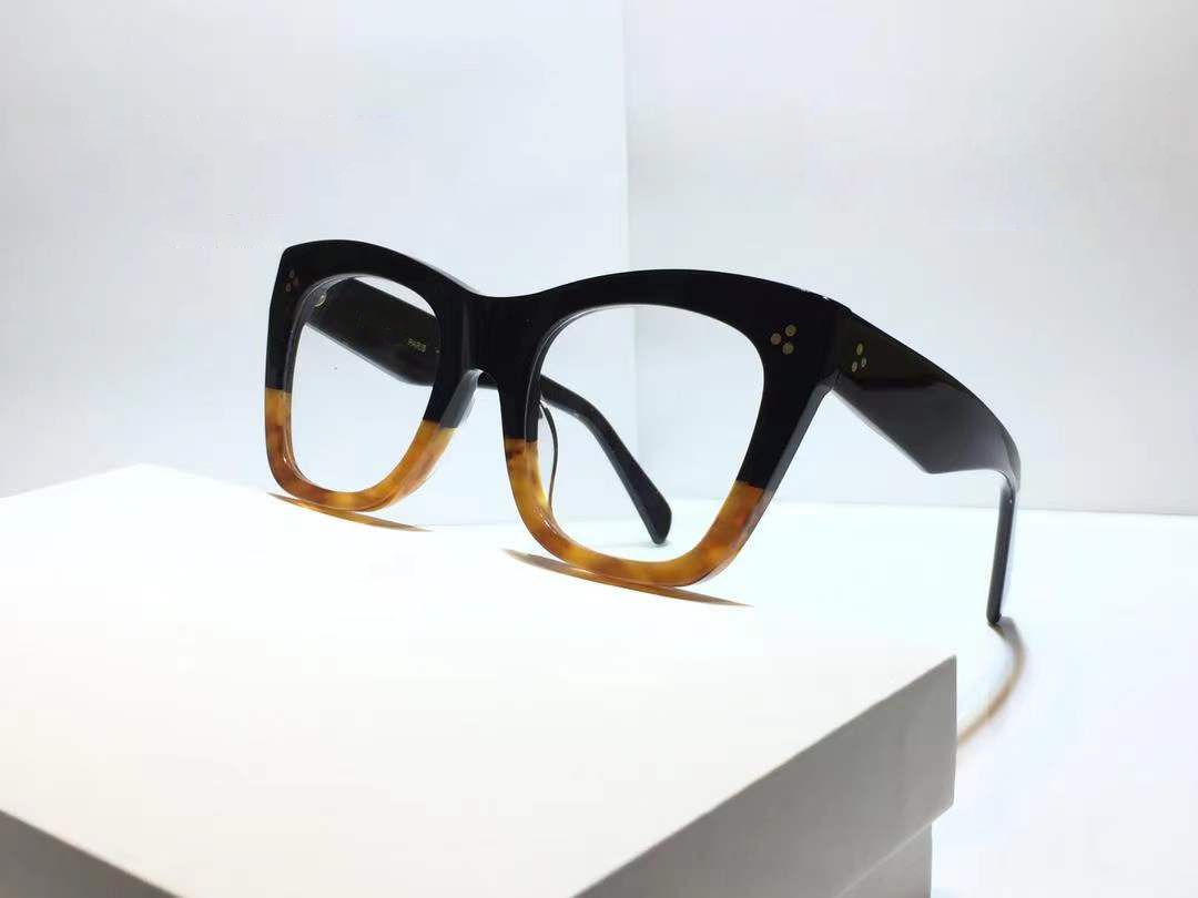 black brown frame clear lens