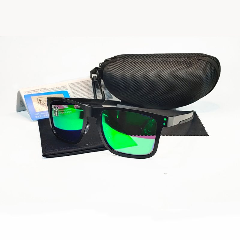 black frame green lens