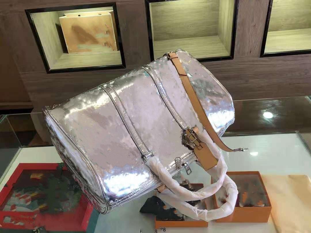 2022 Hand Luggage Travel Bag Silver Embossed Handbag Boston European And  American Style Men Unisex Women Duffel Duffle Bags From Chengxinyi1, $81.02
