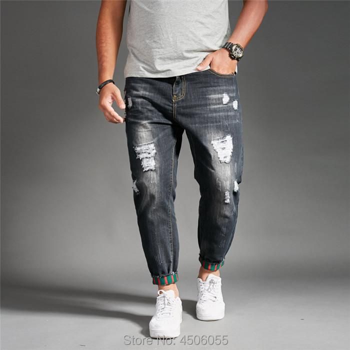 jeans neri strappati