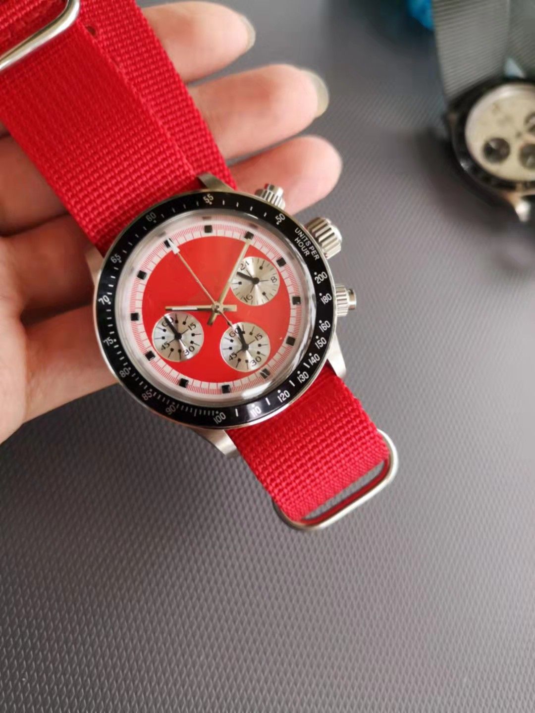 red fabric strap red face