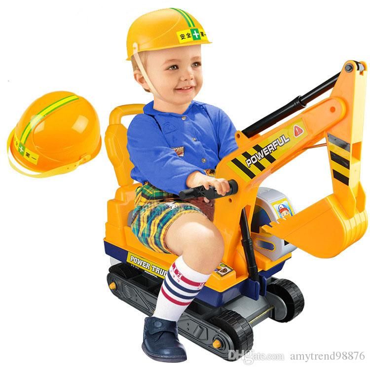 childs sit on digger toy