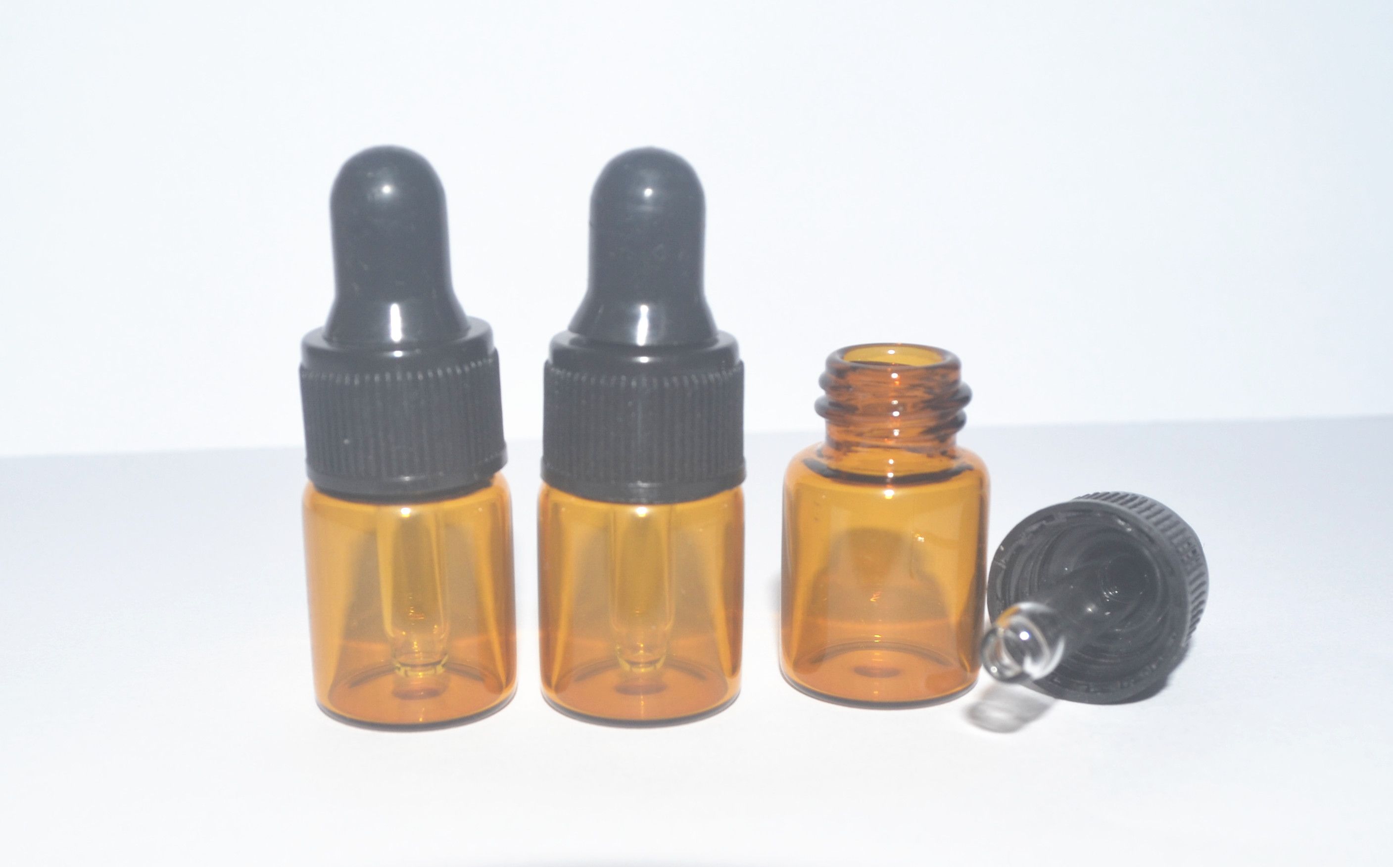 Wholesale 2ml Amber Glass Dropper Bottle W/Black Cap For Essential Oil