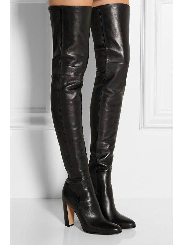 woman in black leather thigh high boots