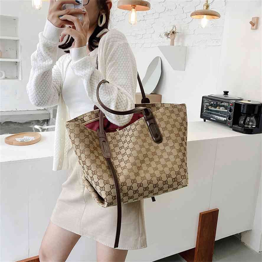 delta comfort plus checked bolsa