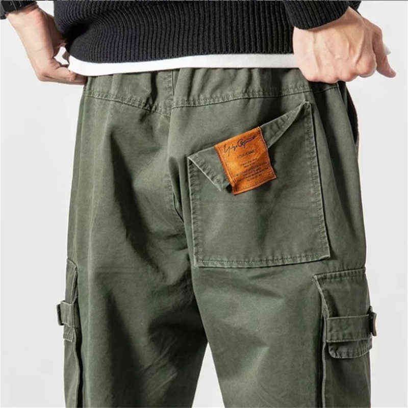 Compra Pantalones De Carga Al Aire Libre Para Hombres Tendencia Juvenil  Elástico Herido Pantalón Suelto Pantalón Jotaje Pantalones Straight Street  Spring Summer G1217 Barato | Entrega Rápida Y Calidad | Es.Dhgate
