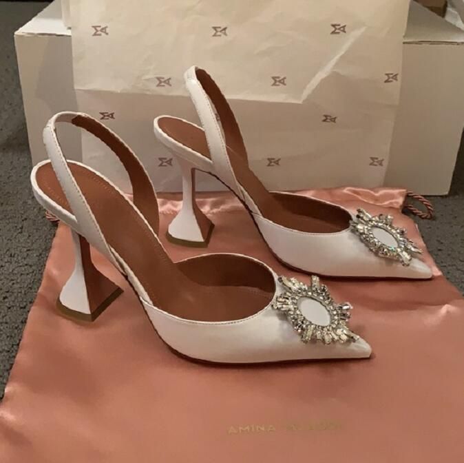 white amina muaddi heels