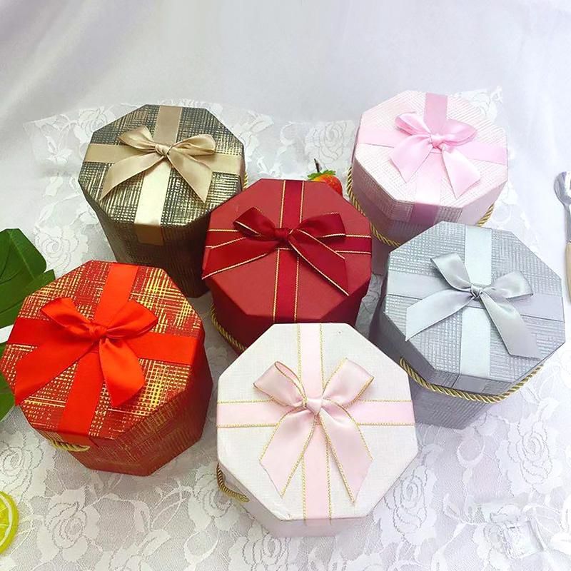 Envoltura de regalo Papel portátil Cajas de caramelo brillo octagonal con bowknot bodks fiesta de boda envolviendo el día de San Valentín