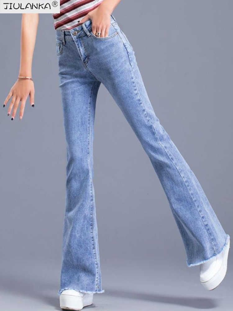 Голубые расклешенные джинсы6