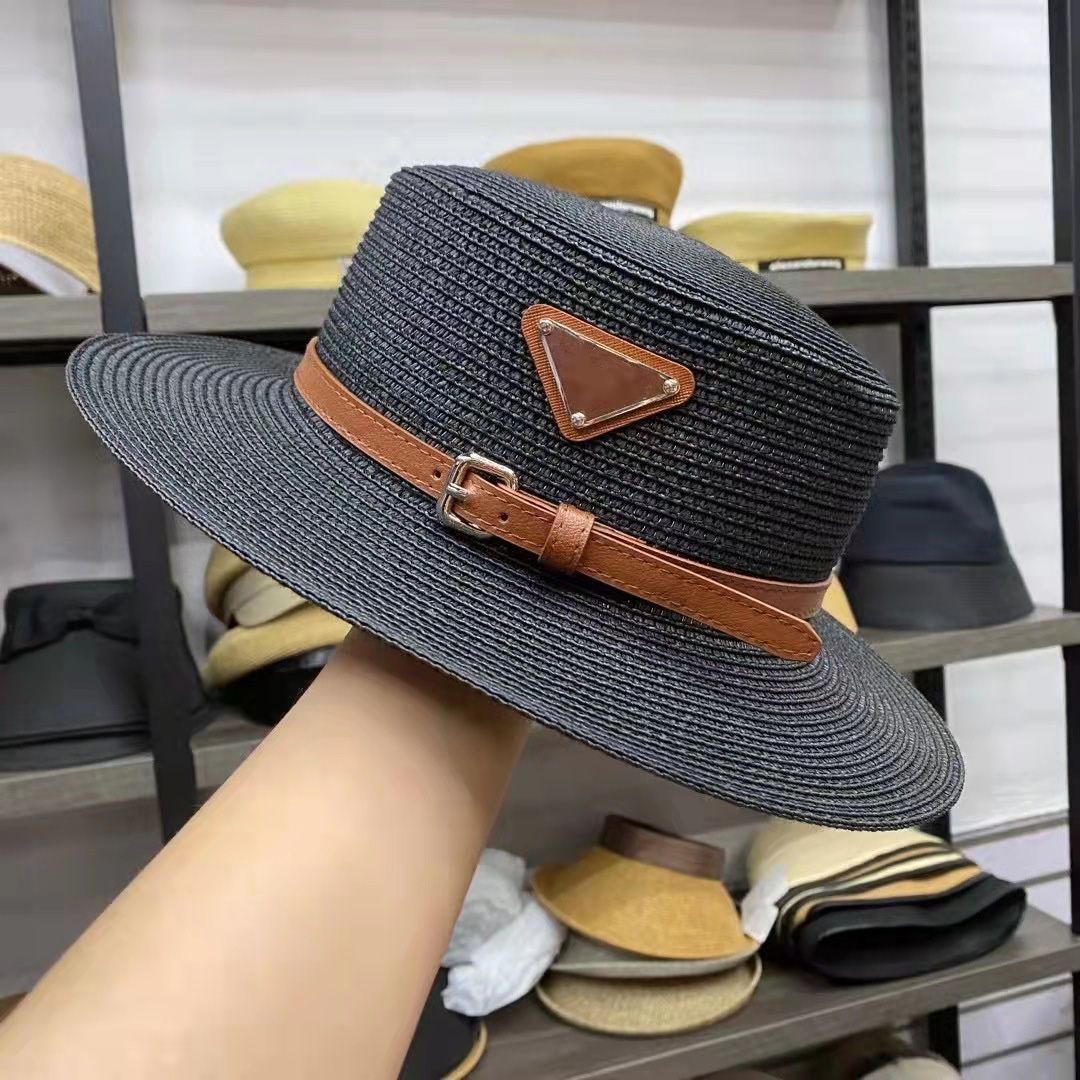 black straw hat with brown belt