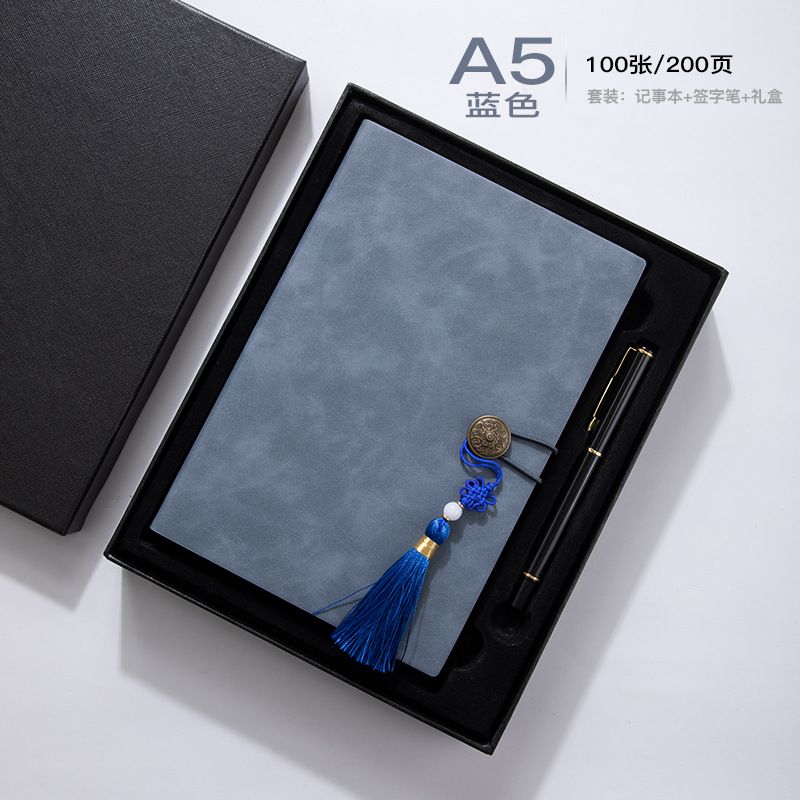 blue norebook with gift box