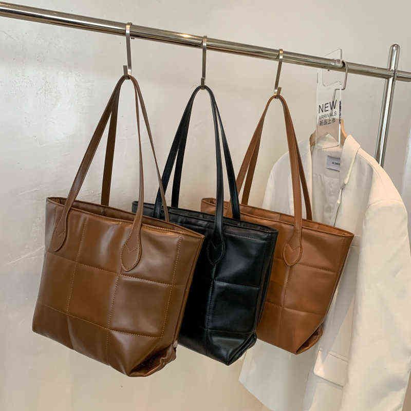 designer saddle handbolsas