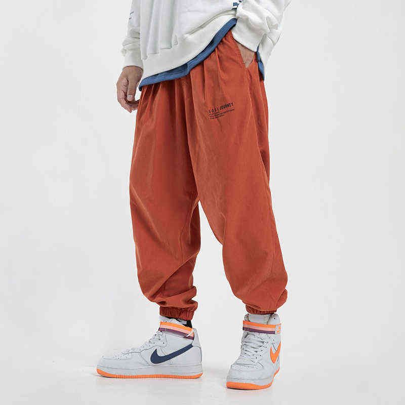 Hommes joggeurs orange