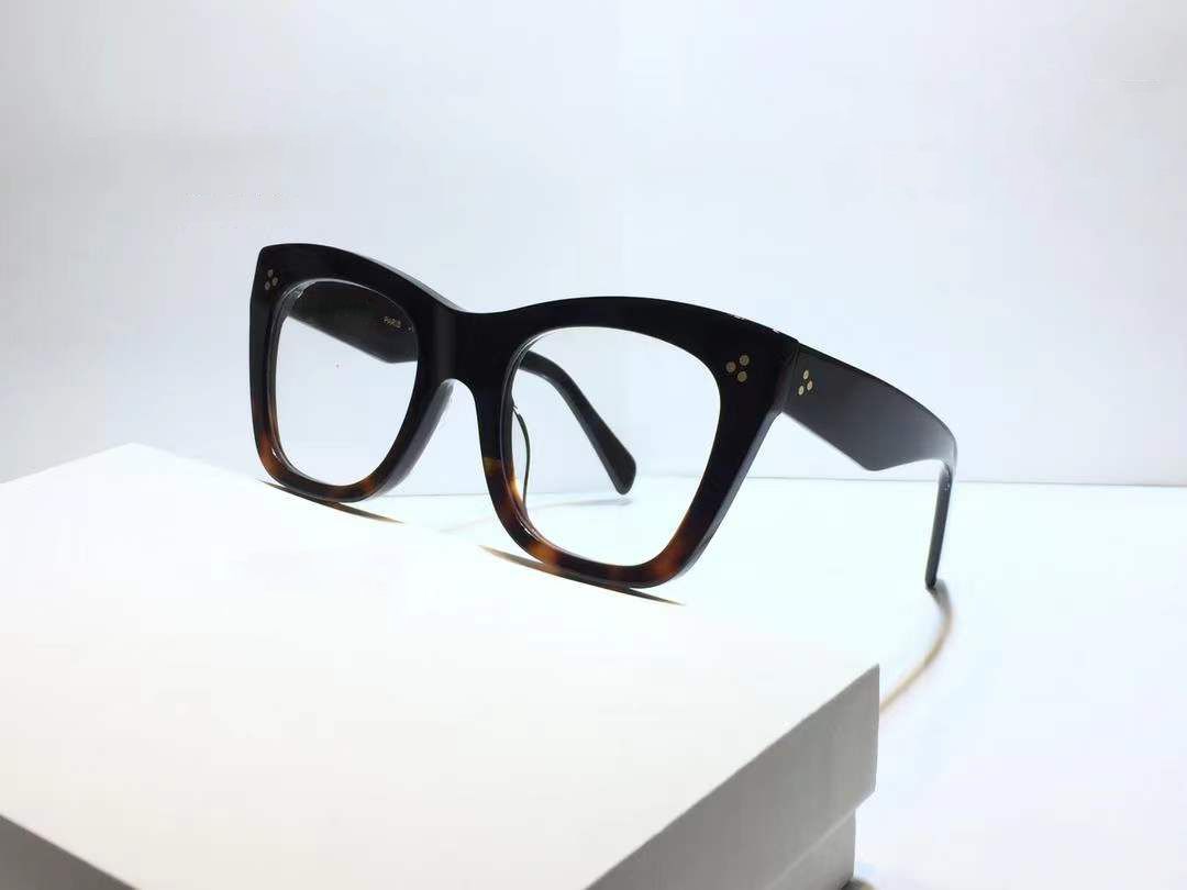 black dark amber frame clear lens